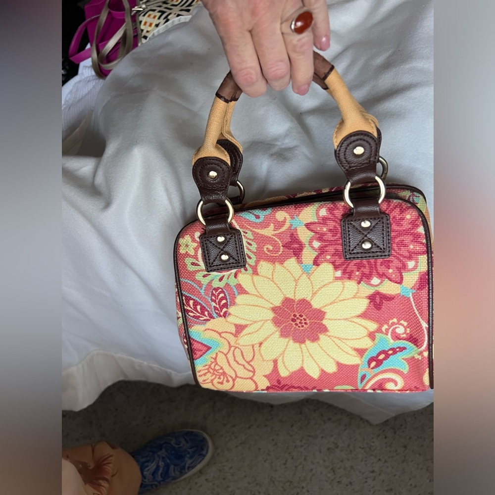 It's a Spartina mini just big enough for all your stuff